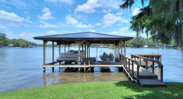 view of dock with a water view