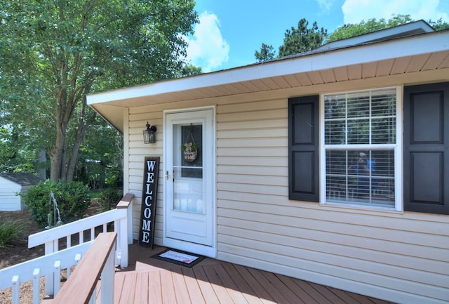 entrance to property featuring a deck