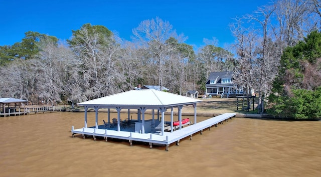 view of dock with a water view