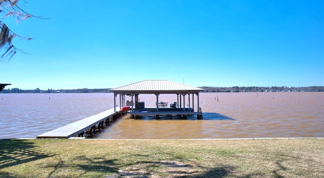 dock area featuring a water view