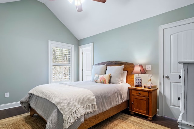 bedroom featuring vaulted ceiling, a ceiling fan, light wood-style flooring, and baseboards