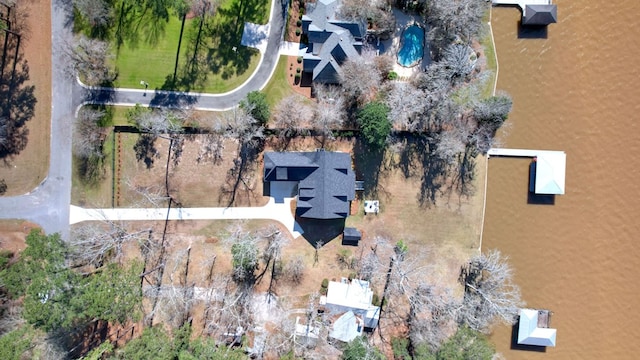 birds eye view of property featuring a water view