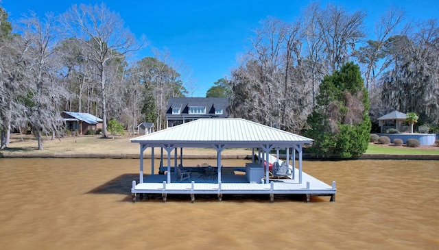 view of dock with a water view and boat lift