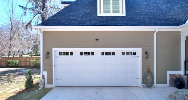 garage with fence