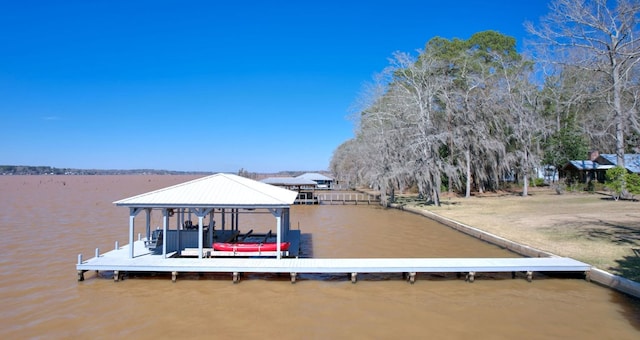 view of dock with a water view and boat lift