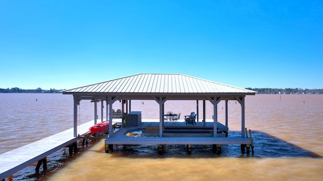 view of dock with a water view and boat lift