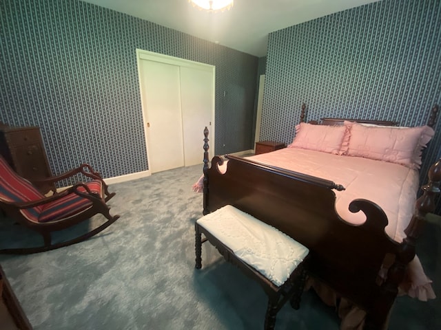 carpeted bedroom with a closet