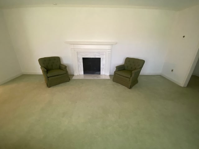 unfurnished room featuring light carpet