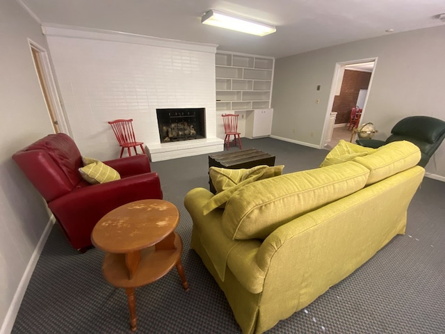 living room featuring dark carpet and a fireplace