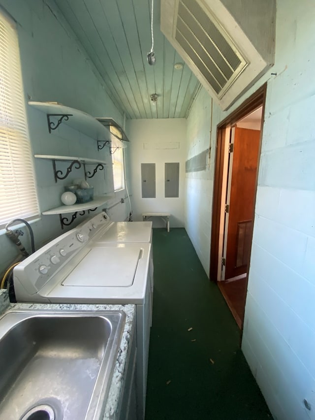 washroom with sink and electric panel