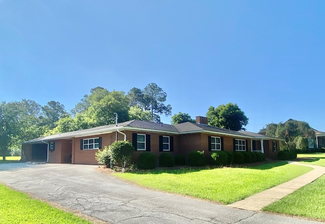 ranch-style house with a front yard