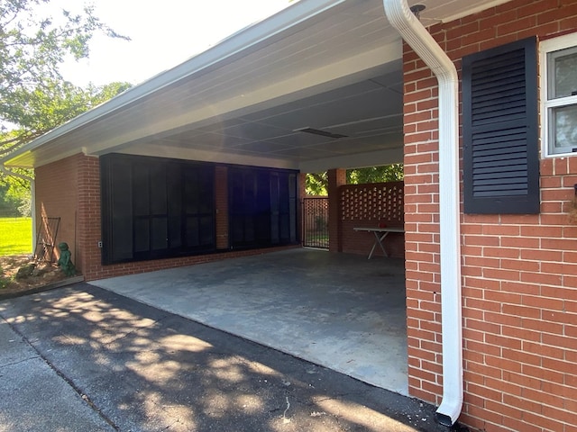 exterior space with a carport