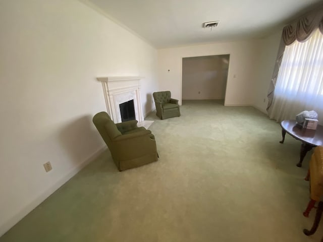 unfurnished room with light colored carpet