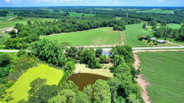 aerial view featuring a rural view and a water view