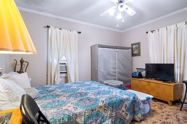 bedroom with ceiling fan and ornamental molding