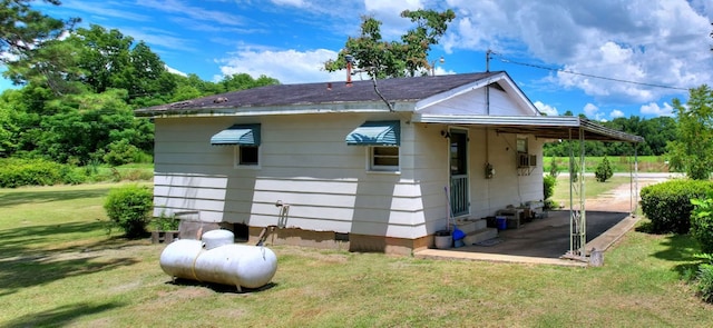 exterior space with a yard