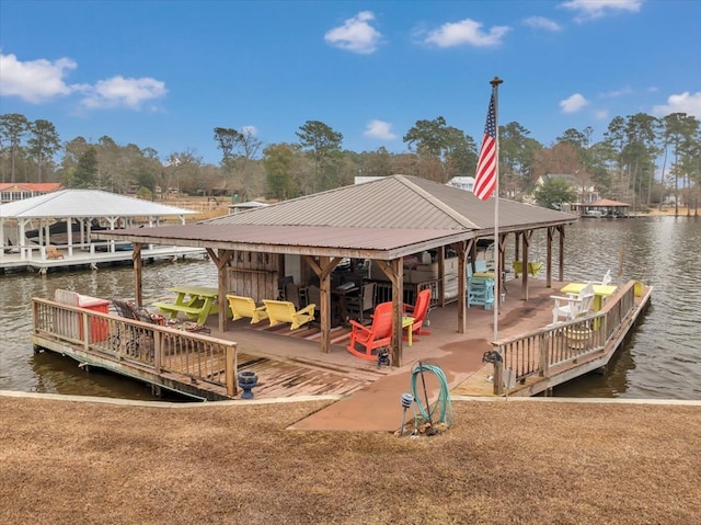 dock area with a water view