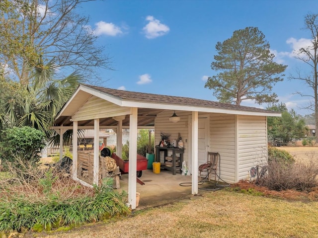 exterior space featuring an outdoor structure