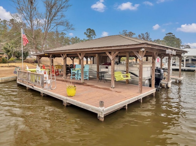 view of dock with a water view