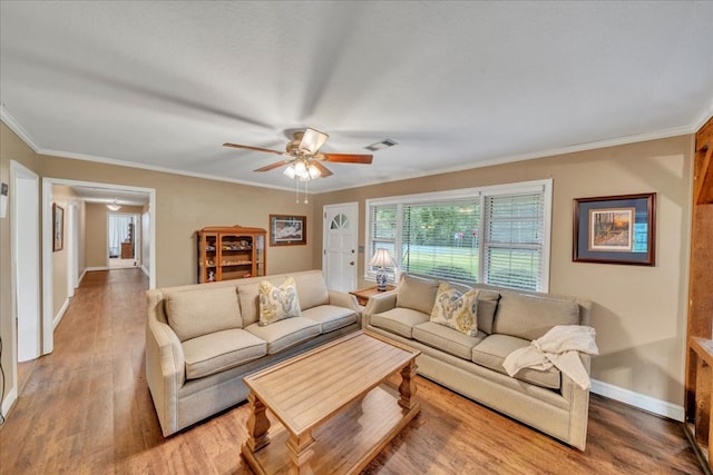 2489 W Ga Highway 30, Americus, GA 31719 - living area featuring ceiling fan, wood finished floors, baseboards, and ornamental molding