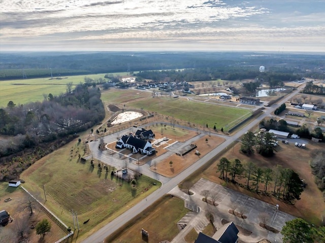 birds eye view of property featuring a rural view