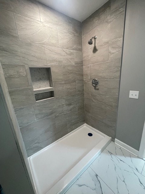 510 E 25th Ave, Cordele, GA 31015 - full bath with marble finish floors, a tile shower, and baseboards