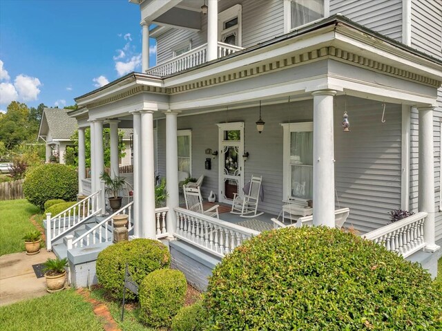 doorway to property featuring covered porch