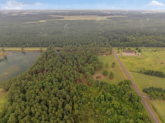 birds eye view of property with a rural view