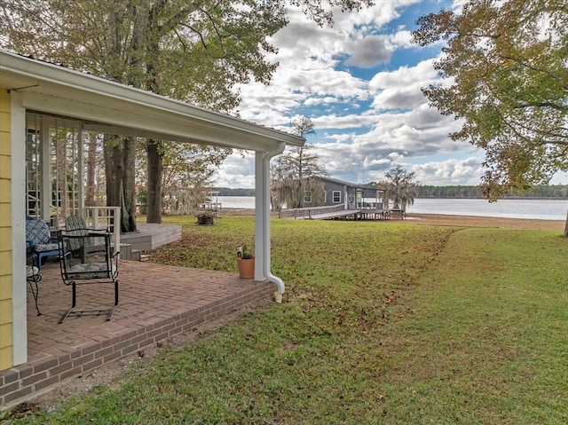 view of yard with a water view