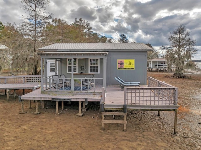 rear view of house with a deck