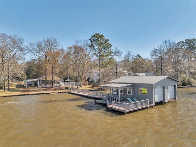 view of dock with a water view