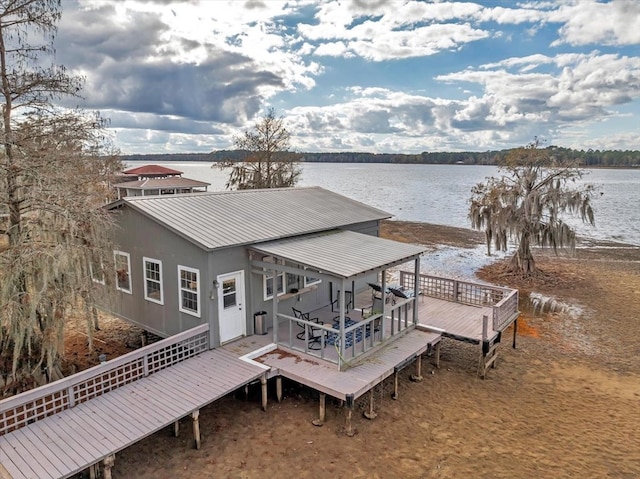 exterior space with a water view