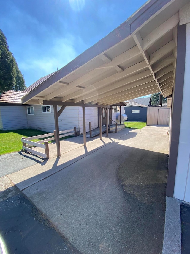 view of car parking featuring a carport