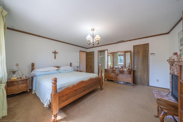 carpeted bedroom with a notable chandelier, a fireplace, and ornamental molding