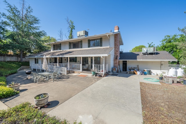 rear view of property with a patio