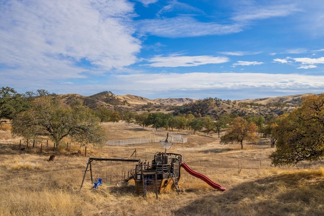 mountain view featuring a rural view