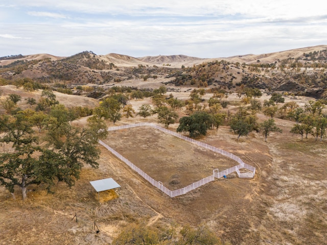 aerial view featuring a mountain view and a rural view