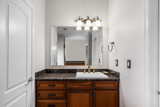 bathroom with vanity with extensive cabinet space