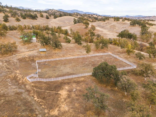 birds eye view of property featuring a rural view