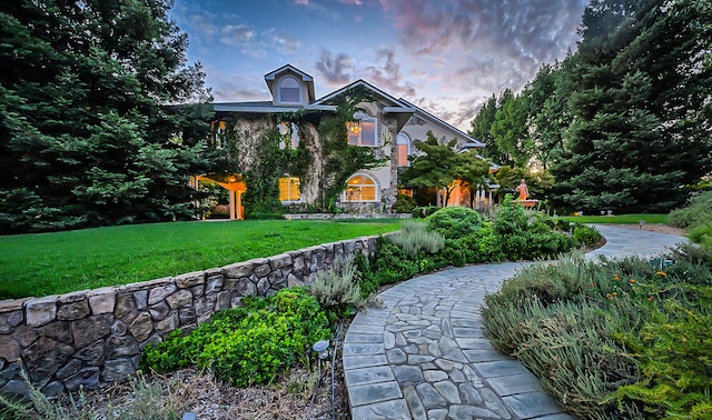 view of front of home featuring a yard