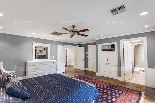 bedroom with ceiling fan, crown molding, connected bathroom, and light tile flooring