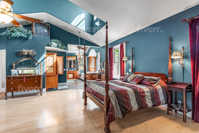 bedroom with ceiling fan and high vaulted ceiling