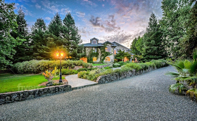 view of front of home featuring a lawn