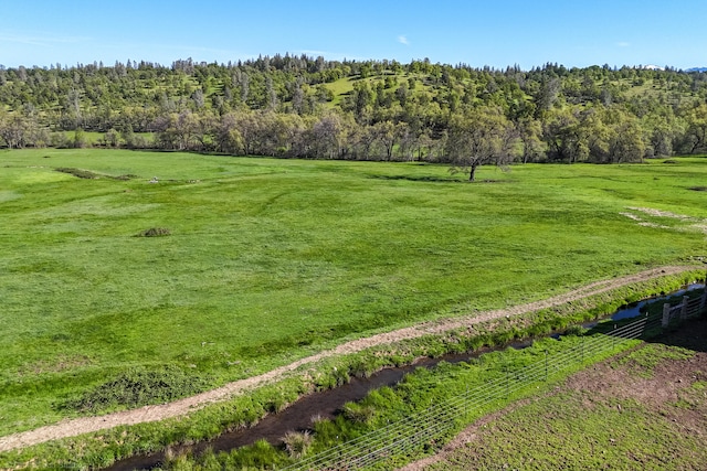 birds eye view of property featuring a rural view