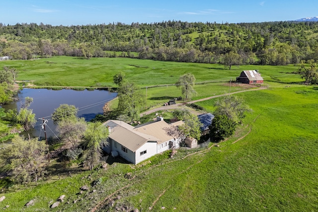 drone / aerial view featuring a rural view and a water view