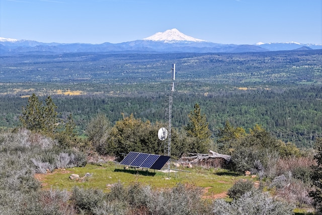 drone / aerial view featuring a mountain view