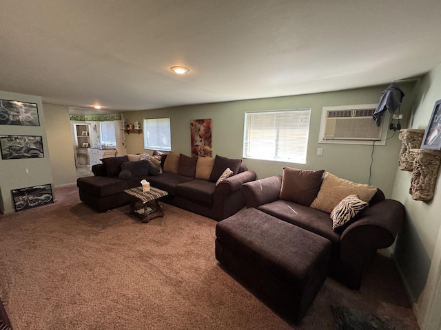 carpeted living room with a wall mounted AC