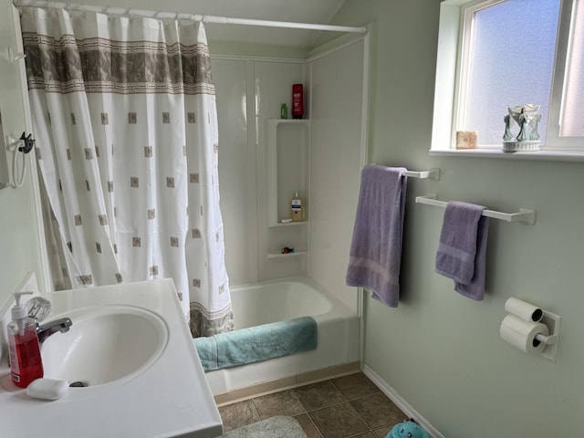 bathroom with tile floors, shower / bath combination with curtain, and vanity