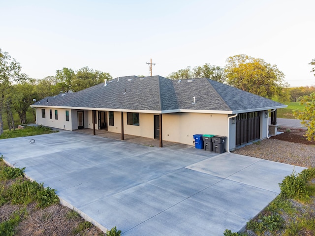 back of property featuring a patio area