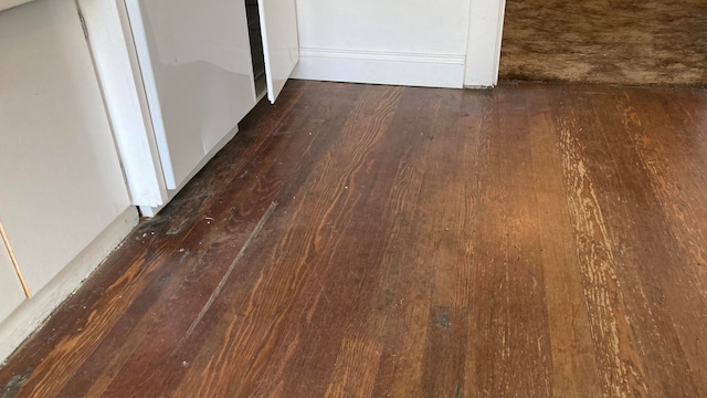 details with dark wood-type flooring